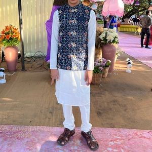 Indian kurta and jacket/ vest set.